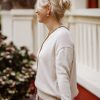Pastelinis moteriškas megztas megztinis