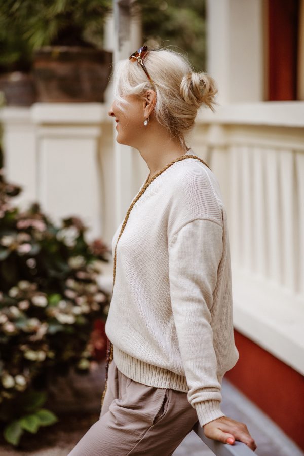 Pastelinis moteriškas megztas megztinis